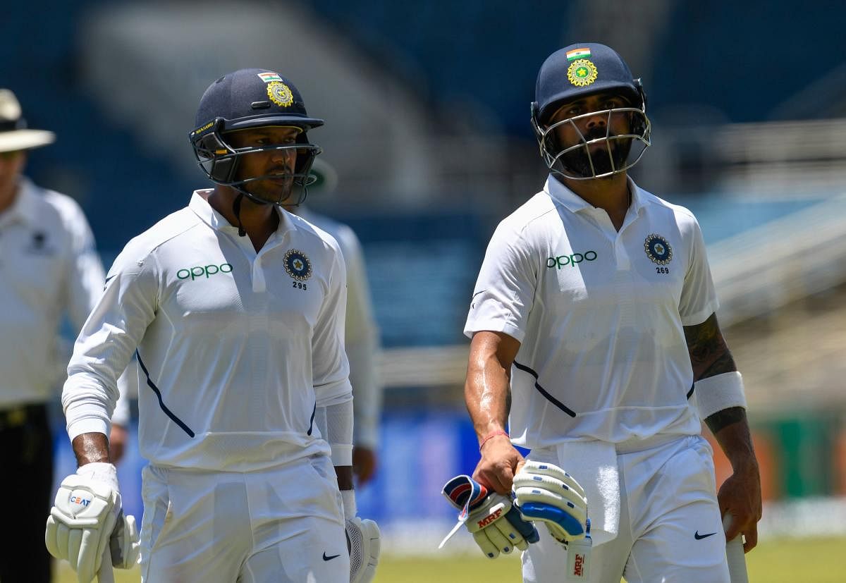 Agarwal and Kohli scored crucial fifties to take India to a competitive total on Day 1 (AFP Photo)