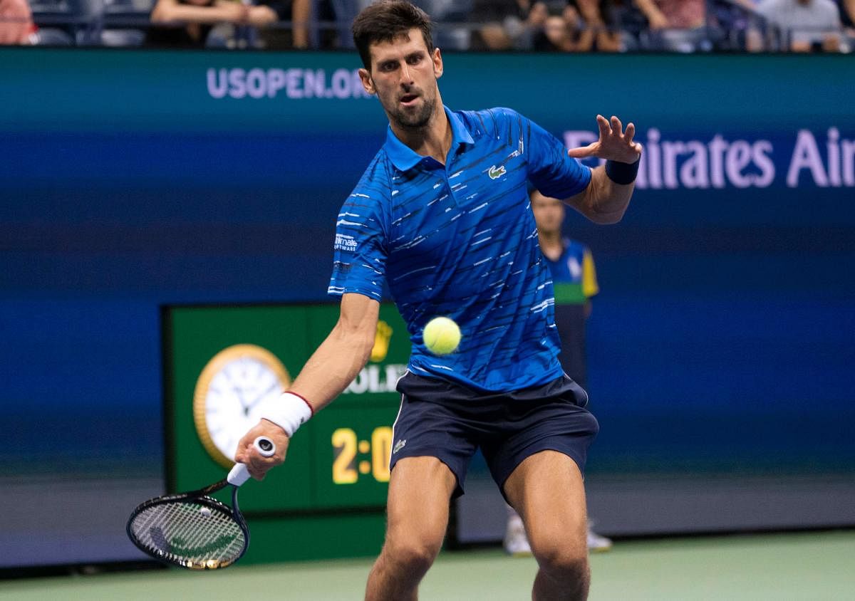 Novak Djokovic of Serbia returns the ball to Denis Kudla of the US during the Round Three Men's Singles match of the 2019 US Open at the USTA Billie Jean King National Tennis Center. AFP