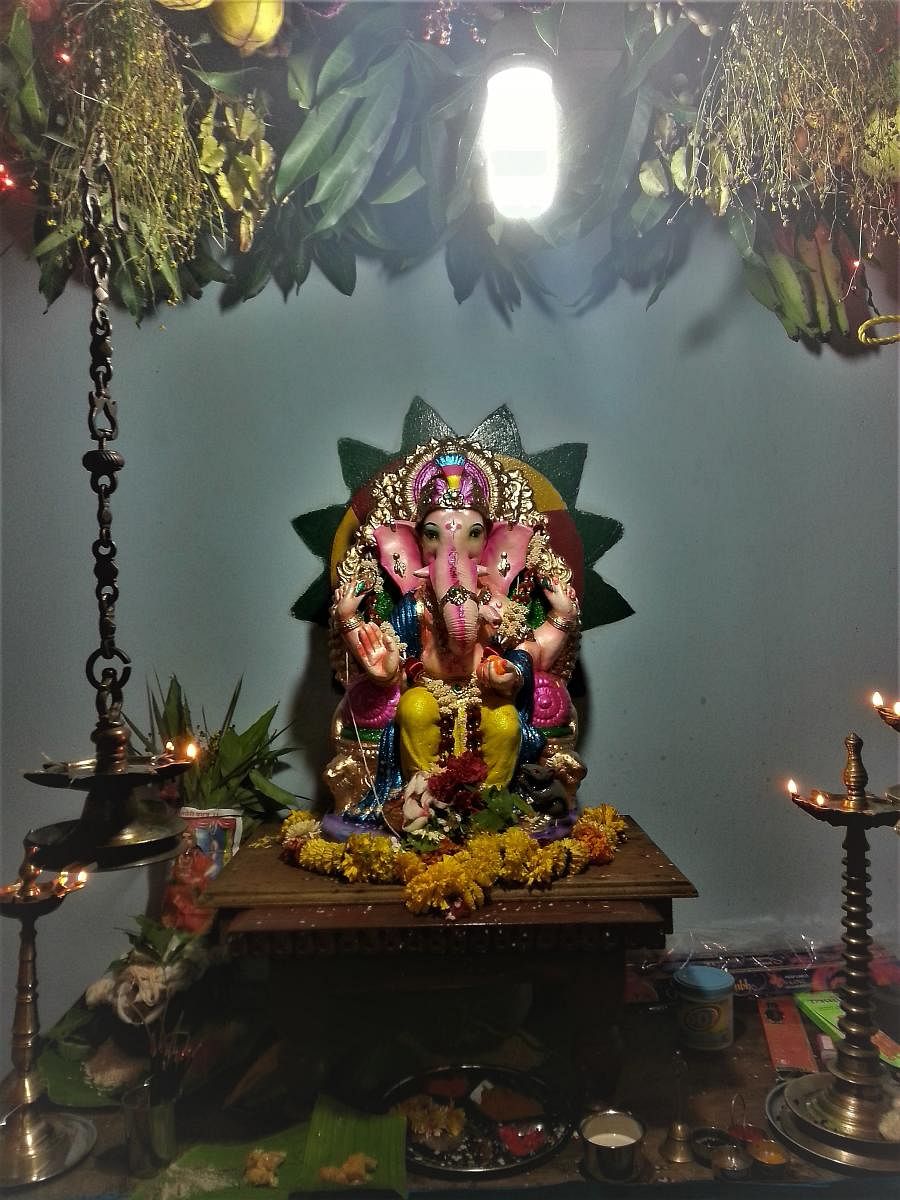 A decorated idol of Lord Ganesha with the 'matoli'