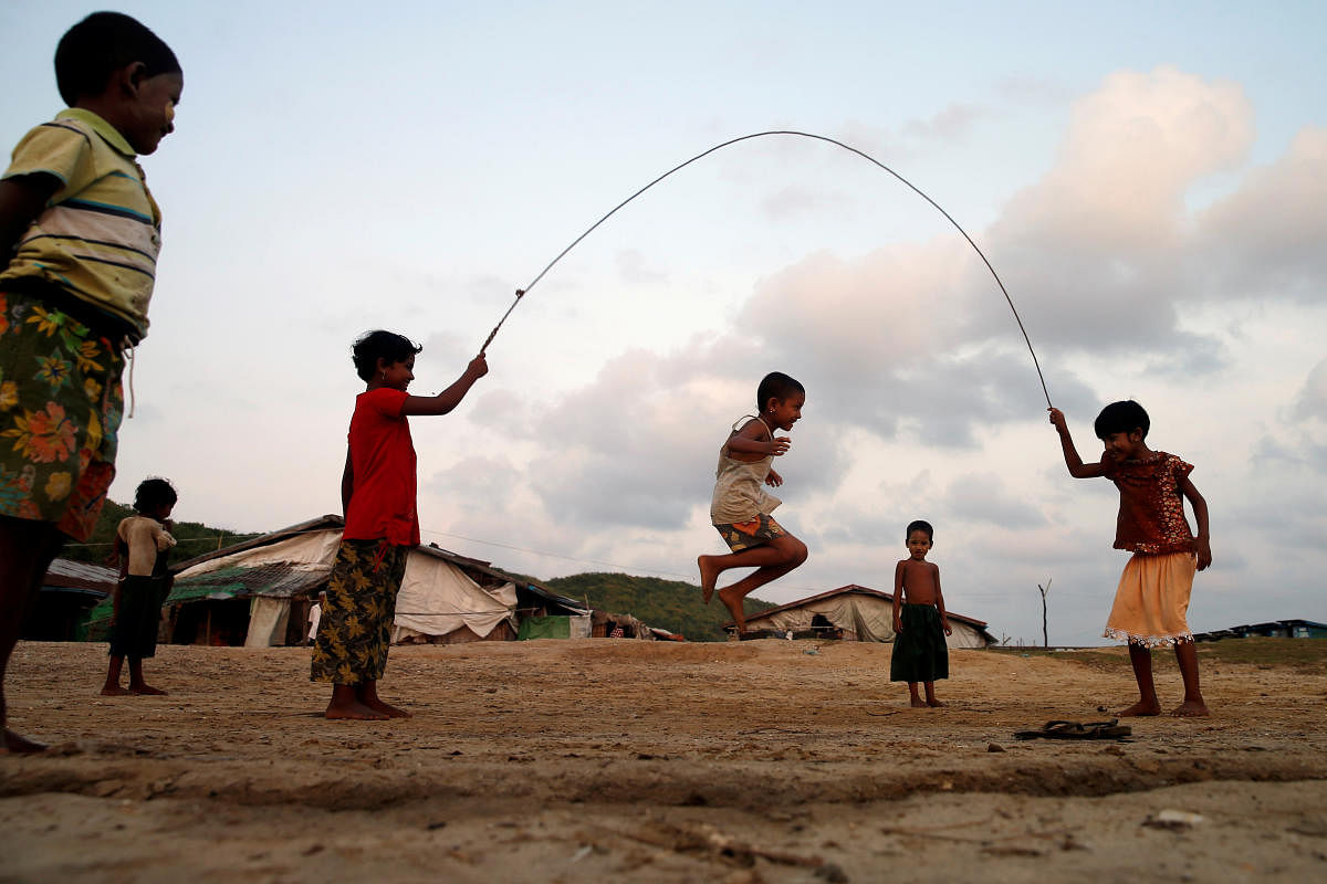 Boys play inside a Rohingya refugee camp outside Kyaukpyu in Rakhine state, Myanmar. (Photo by Reuters)