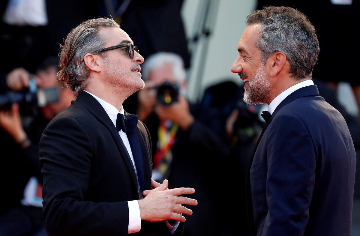 Joaquin Phoenix's (L) portrayal of popular supervillain, 'Joker' garnered a lot of praise from all sections. Reuters Photo