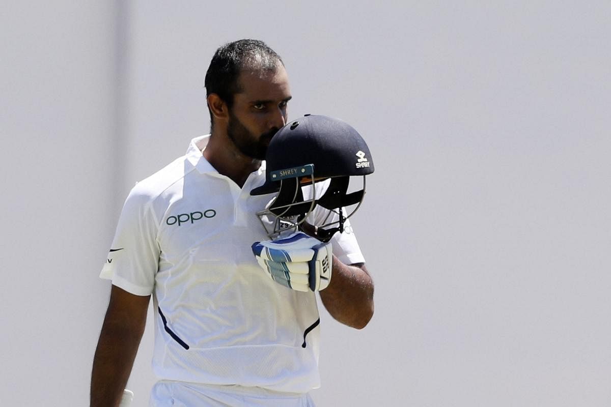 Kingston: India's Hanuma Vihari celebrates after he scored a century against West Indies during day two of the second Test cricket match at Sabina Park cricket ground in Kingston, Jamaica. (PTI Photo)