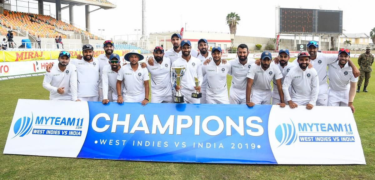 India team with trophy after winning on day 4 of the 2nd and final Test between West Indies and India at Sabina Park, Kingston, Jamaica, on September 2, 2019. (AFP)