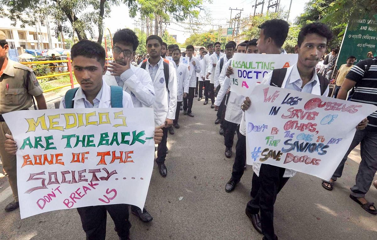 Guwahati: Senior and junior doctors take out a protest rally against the alleged assault on a senior doctor. (PTI Photo)