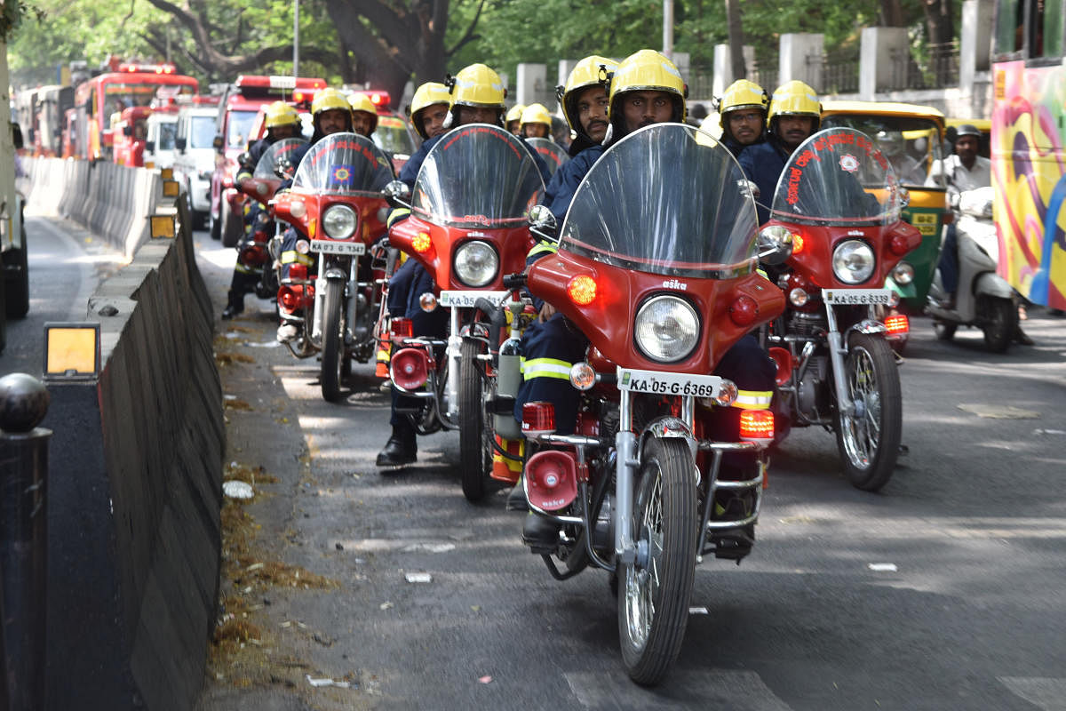 Fire men held a rally on the occasion of Fire week organised by Karnataka State Fire and Emergency service starts at R A Mundurkar Academy premises in Bangalore on Saturday. Photo by S K Dinesh
