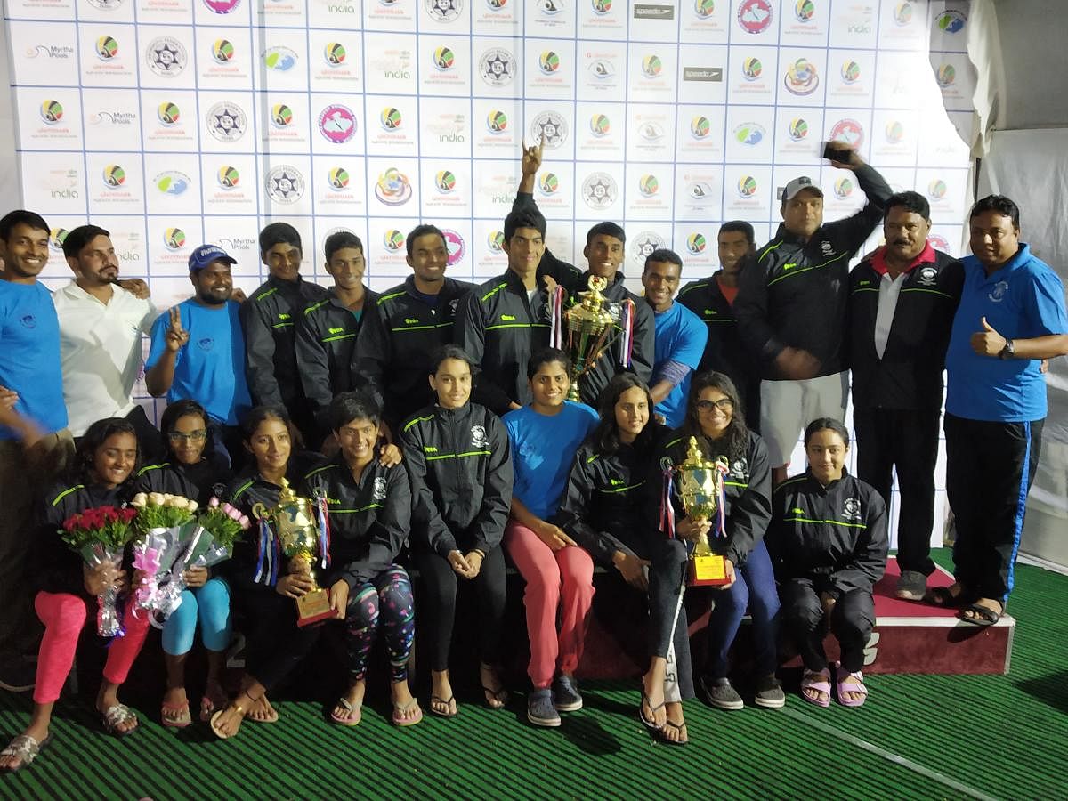 The Karnataka team, champions of the 73rd Glenmark Senior National Aquatic Championships in Bhopal on Wednesday. 