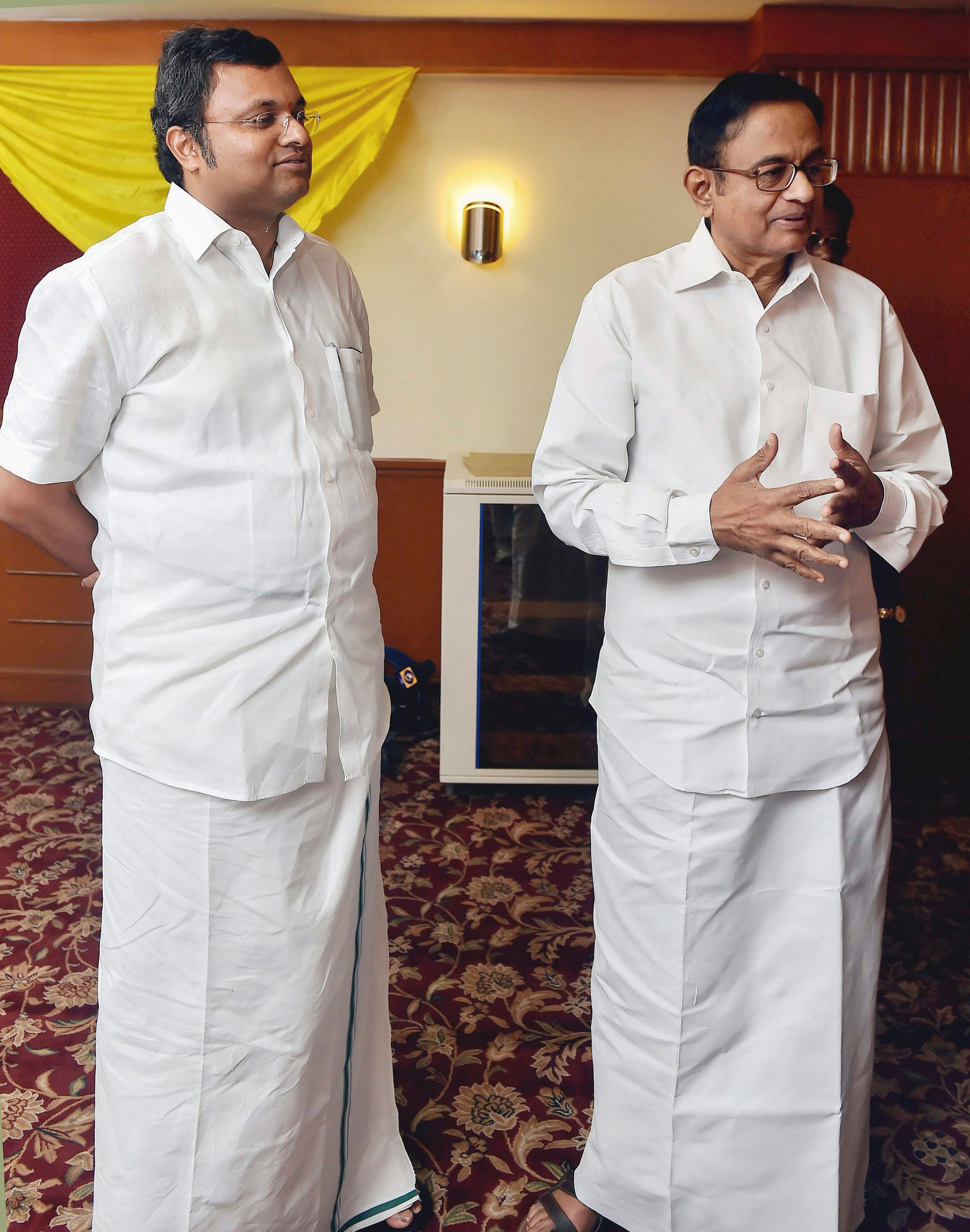 Former finance minister P Chidambaram with his son Karti P Chidambaram. (File Photo)