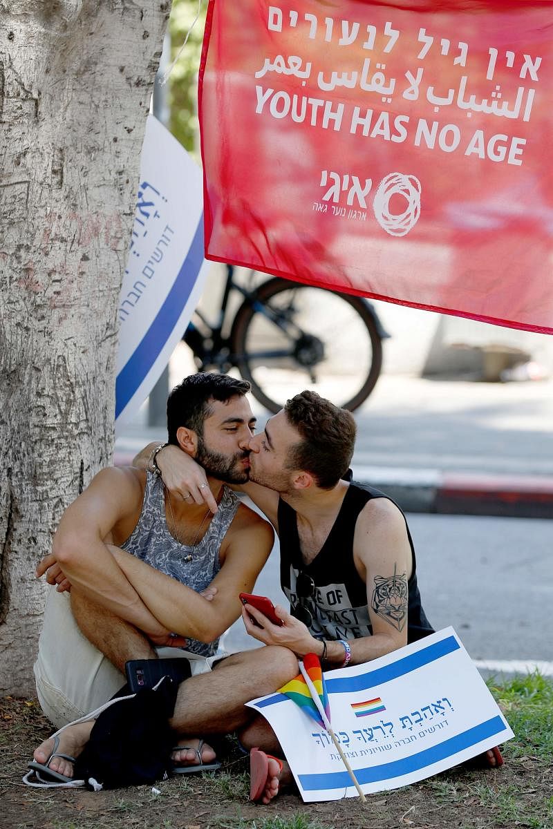 Gay men around the world receive less paid parental leave than lesbian or heterosexual couples. (AFP Photo)