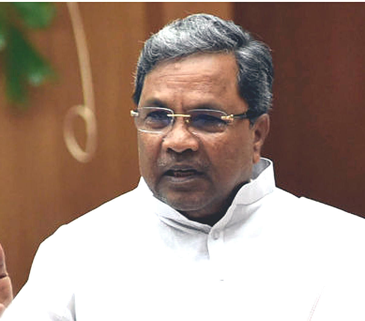 We have asked our party workers to stage protests peacefully, Siddaramaiah told media persons here on Thursday, on his way to Badami. (DH File Photo)