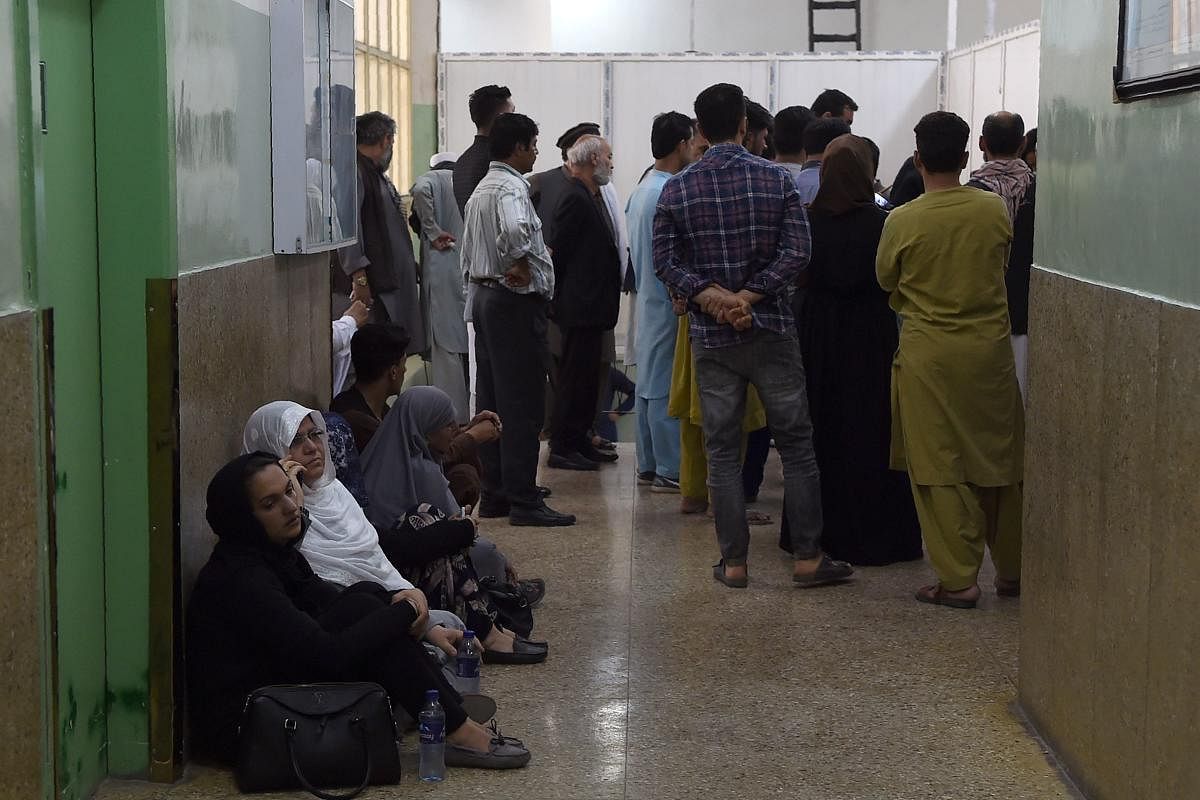 Relatives of people impacted by a suicide attack wait for information at the Wazir Akbar Khan hospital following the blast in Kabul on September 5, 2019. AFP Photo