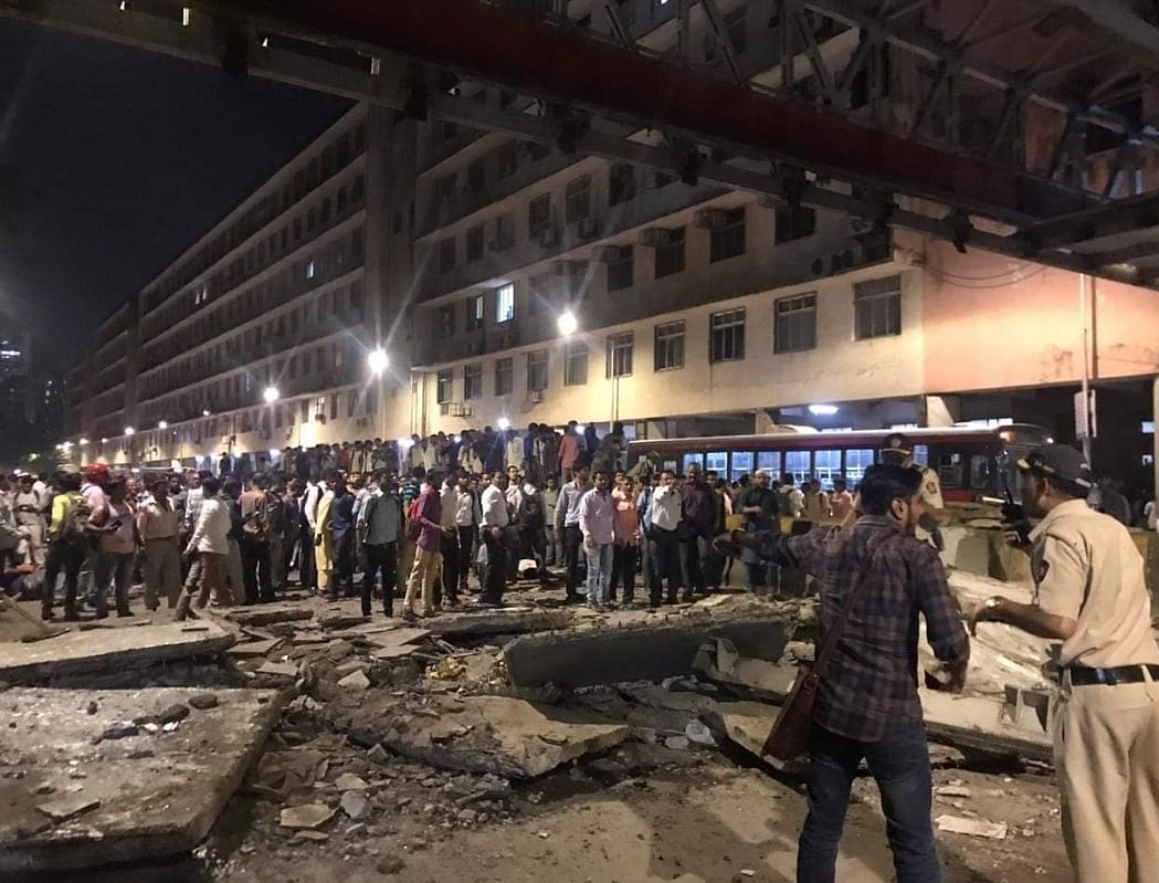 A foot overbridge connecting Chhatrapati Shivaji Maharaj Terminus (CSMT) railway station to Azad Maidan Police Station collapsed on Thursday evening.