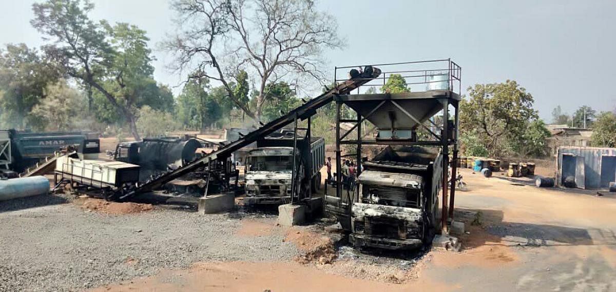 Charred vehicles which were allegedly torched by Maoists at Kurkheda town in Gadchiroli district in Maharashtra on Wednesday. PTI
