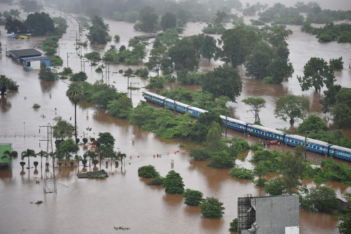 An aerial view shows a stranded Mahalaxmi Express near Badlapur in Thane district of Maharashtra on Saturday. REUTERS