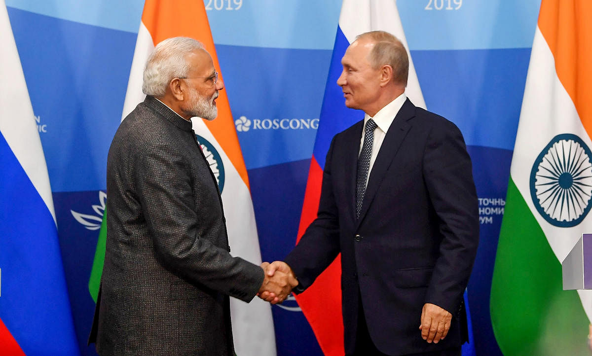 Prime Minister Narendra Modi shakes hands with President of Russian Federation Vladimir Putin during the joint press statements, at Vladivostok, in Russia, Wednesday, Sept 4, 2019. (PIB/PTI Photo)