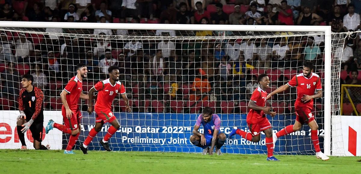 Oman's Rabia Alawi Al Mandhar (centre) celebrates with a team-mate after scoring against India during their FIFA World Cup qualifier in Guwahati on Thursday. PTI