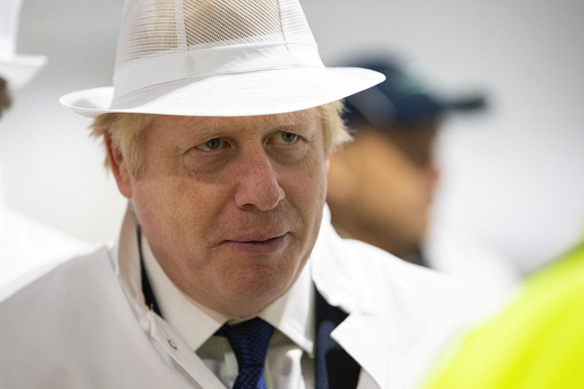Britain's Prime Minister Boris Johnson visits Peterhead Fish Market in Peterhead, Scotland September 6, 2019. Photo by Reuters