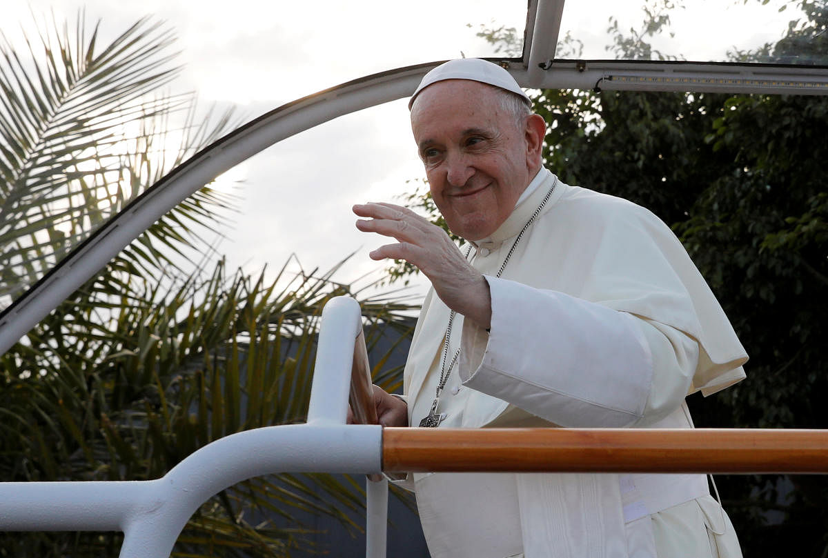 Pope Francis waves as he leaves Ivato International Airport after arriving for a three-day visit, in Antananarivo, Madagascar. (Reuters Photo)