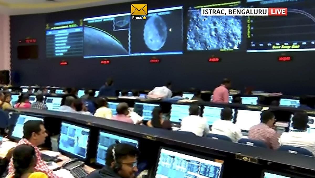 Officials watch live telecast of Chandrayaan 2 at ISRO Telemetry Tracking and Command Network (ISTRAC). (PTI Photo)