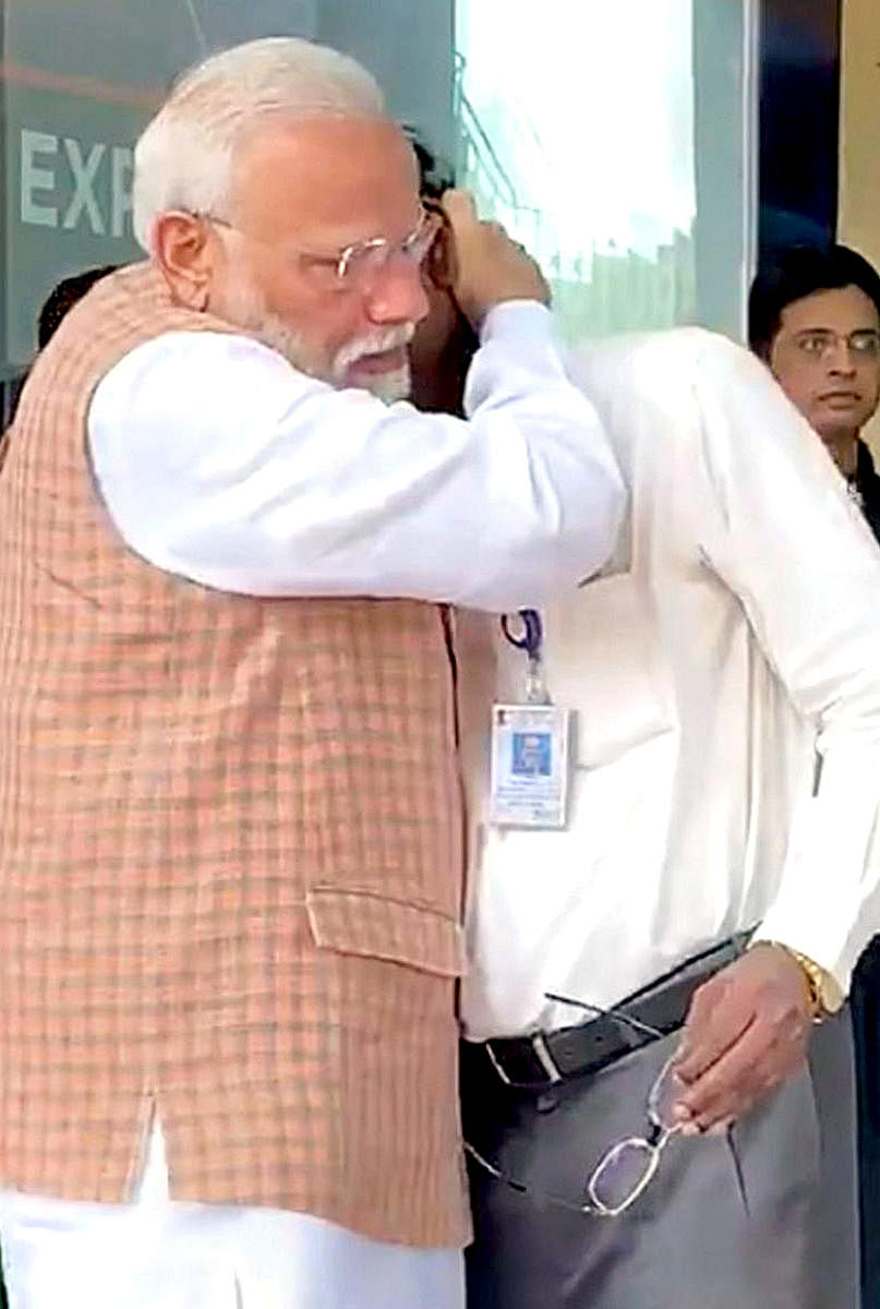 PM Narendra Modi consoles Isro chief K Sivan in Bengaluru. PTI