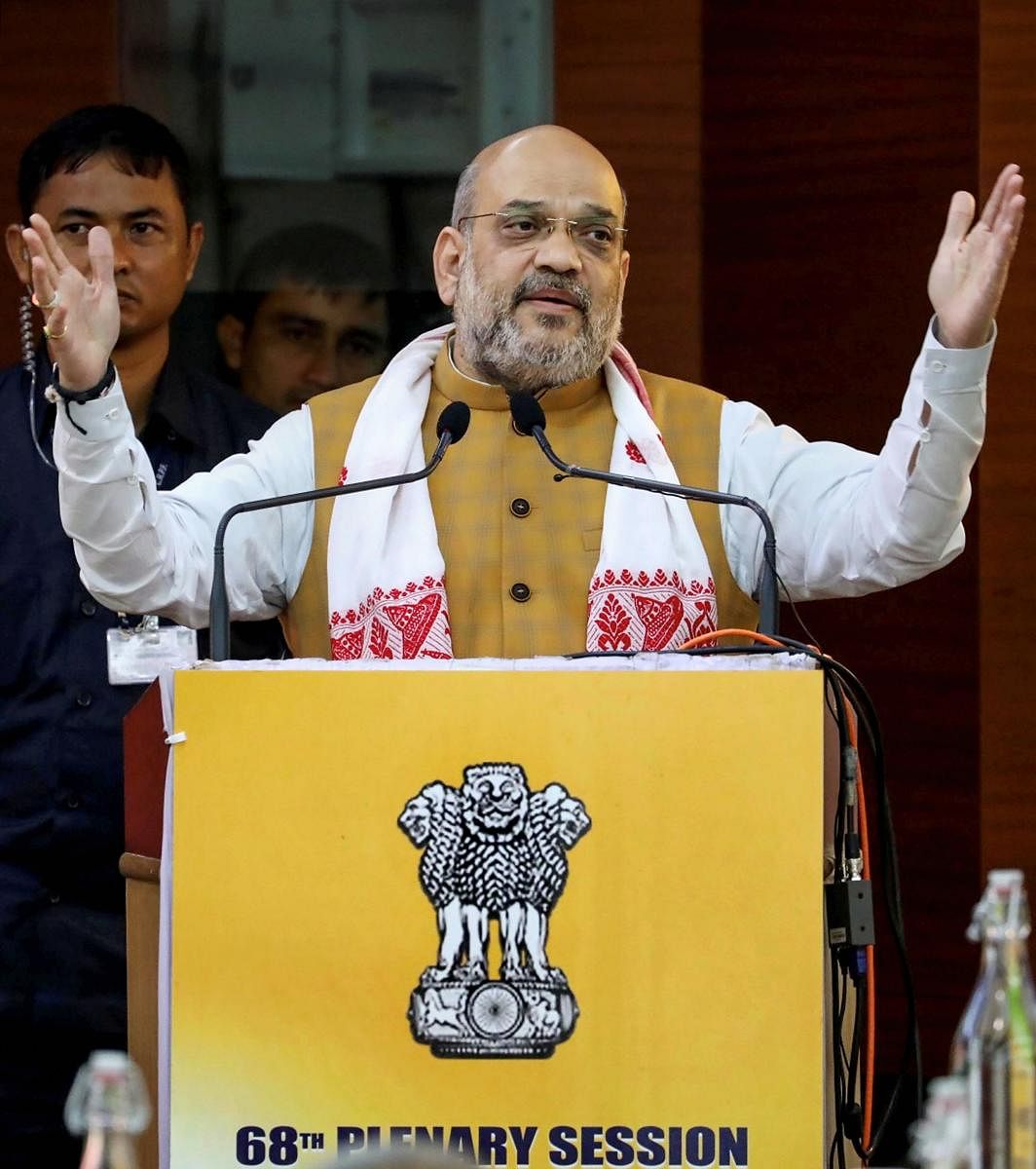 Guwahati: Union Home Minister Amit Shah addresses the 68th Plenary Session of North Eastern Council, at Administrative Staff College, in Guwahati, Sunday, Sept 8, 2019. (PTI Photo)