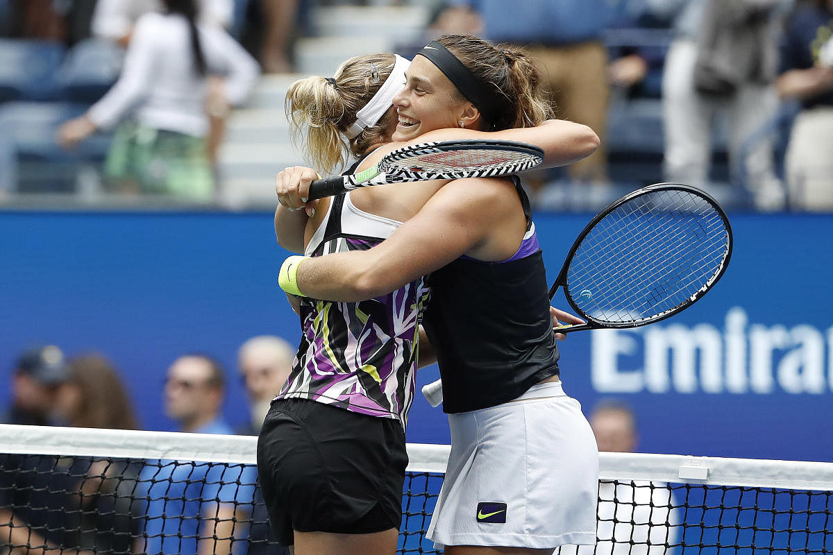 Elise Mertens & Aryna Sabalenka celebrate after their match against Victoria Azarenka and Ashleigh Barty in the women's doubles final at the US Open (Image by USA Today Sports)