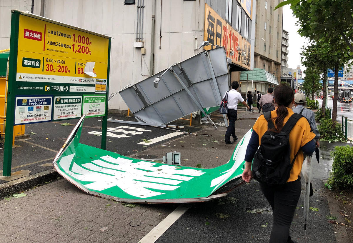 Collapsed steel advertising boards caused by Typhoon Faxai are seen at Edgawa ward in Tokyo, Japan (Reuters Photo)