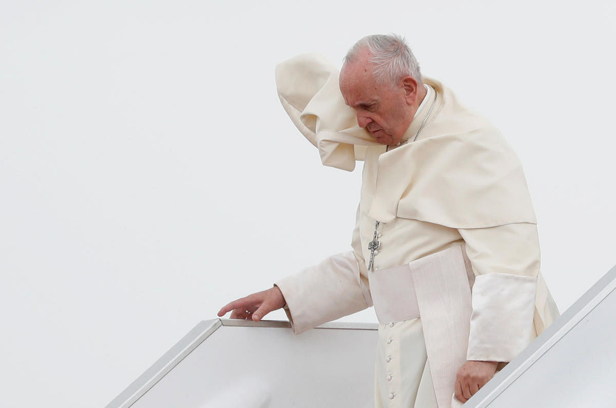 Pope Francis arrives at Port Louis airport, Mauritius (Reuters)