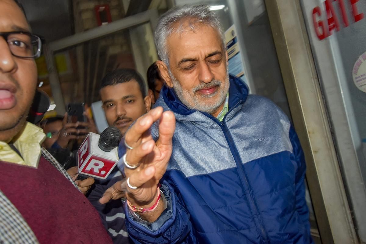 Lobbyist Deepak Talwar, arrested in a money laundering case, being taken to the court by the Enforcement Directorate officials, in New New Delhi, Thursday, Jan 31, 2019. (PTI Photo)