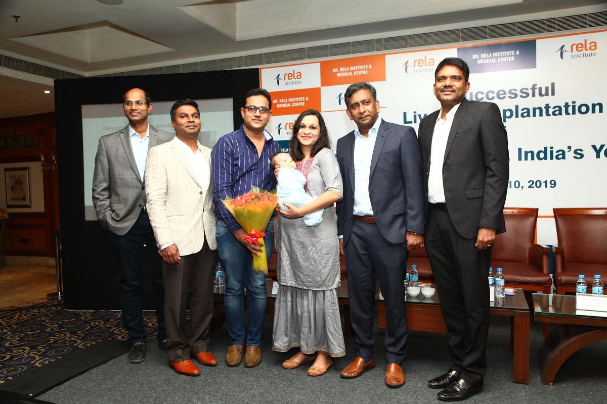 The infant with her parents Kashbi Sayani and Neerav Sayani and doctors Ilankumaran Kaliamoorthy, Mohamed Rela, Naresh Shanmugam and Mettu Srinivasa Reddy.