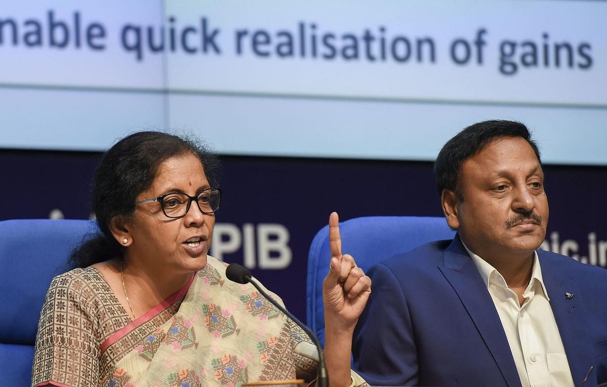  Finance Minister Nirmala Sitharaman with Finance secretary Rajiv Kumar during a press conference to announce the merger of various public sector banks, in New Delhi. PTI File Photo