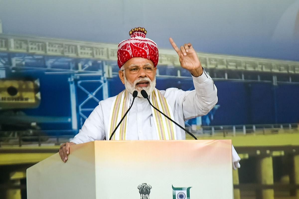 Prime Minister Narendra Modi addresses during the inaugural function of newly constructed Jharkhand Assembly, Sahebgunj Multiport and launch of Kisan Maan Dhan Yojana at Prabhat Tara Ground, in Ranchi district of Jharkhand, Thursday, Sept. 12, 2019. (PTI Photo)