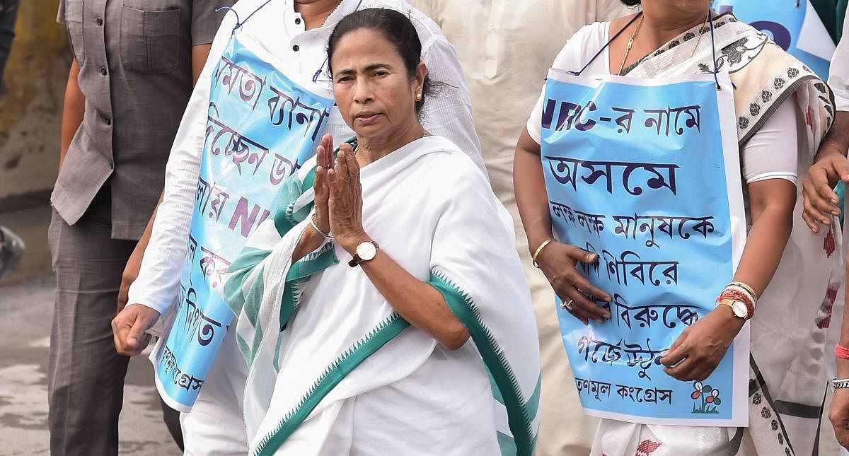 West Bengal Chief Minister Mamata Banerjee leads a protest march against National Register of Citizens (NRC) in Assam, in Kolkata. (PTI Photo)
