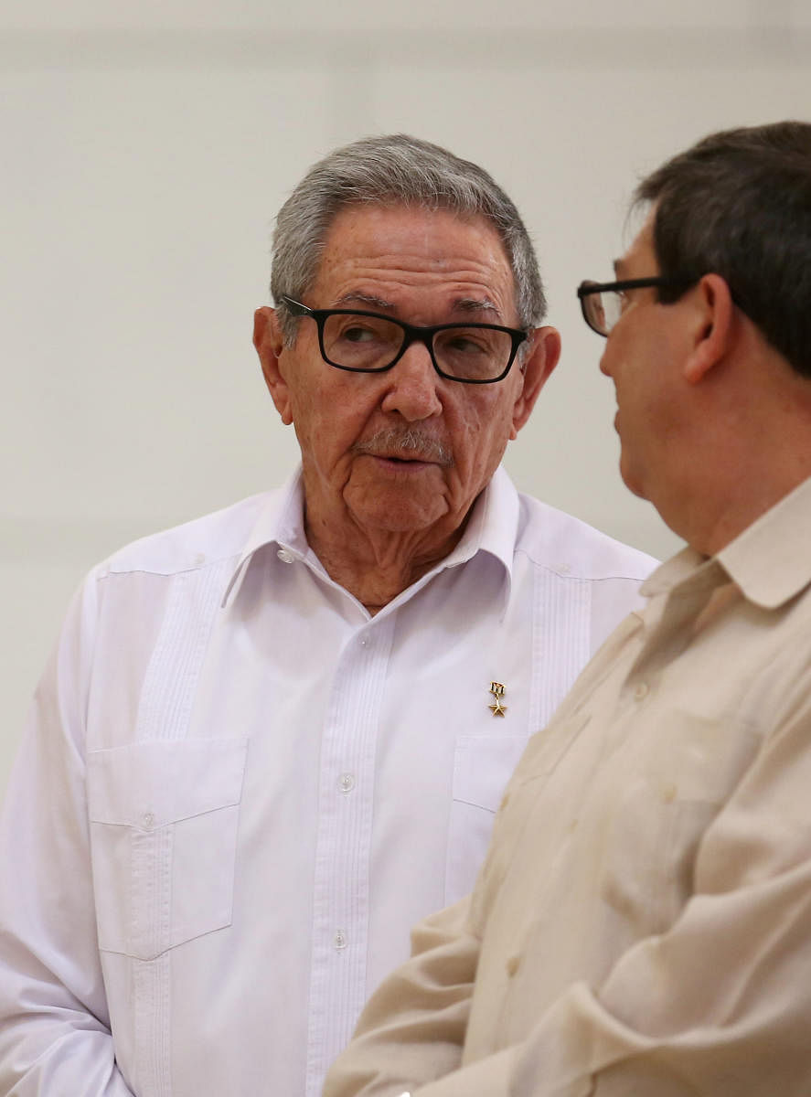 Cuba's First Secretary of the Communist Party and former President Raul Castro (L) talks with Cuba's Foreign Minister Bruno Rodriguez during an event with Russian Foreign Minister Sergei Lavrov (not pictured). (Photo by Reuters)