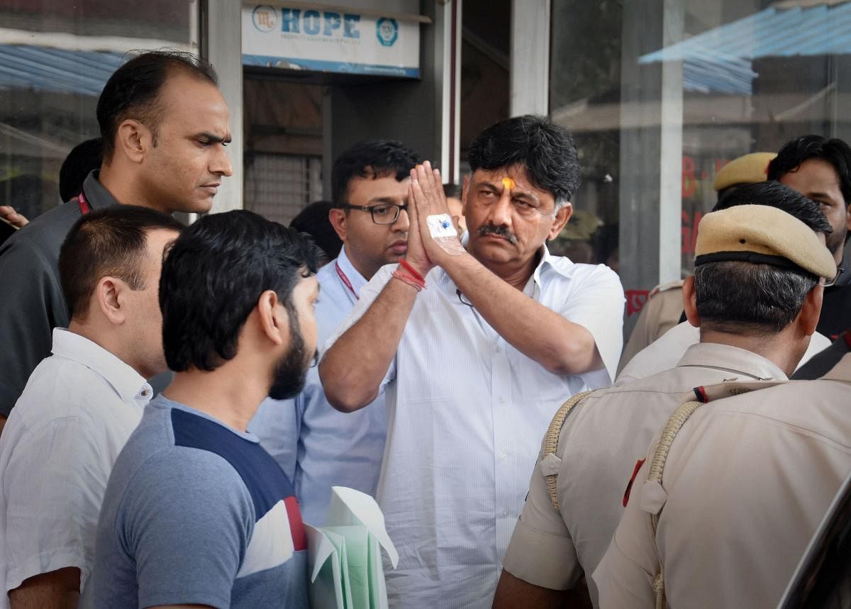 Congress leader DK Shivakumar leaves the Enforcement Directorate (ED) office before being produced at a special court in connection with a money-laundering probe against him, in New Delhi. (PTI Photo)
