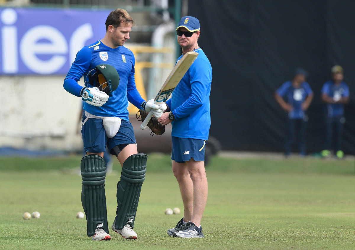 David Miller with batting coach Lance Klusener during a practice session, in Dharamshala. (PTI Photo)