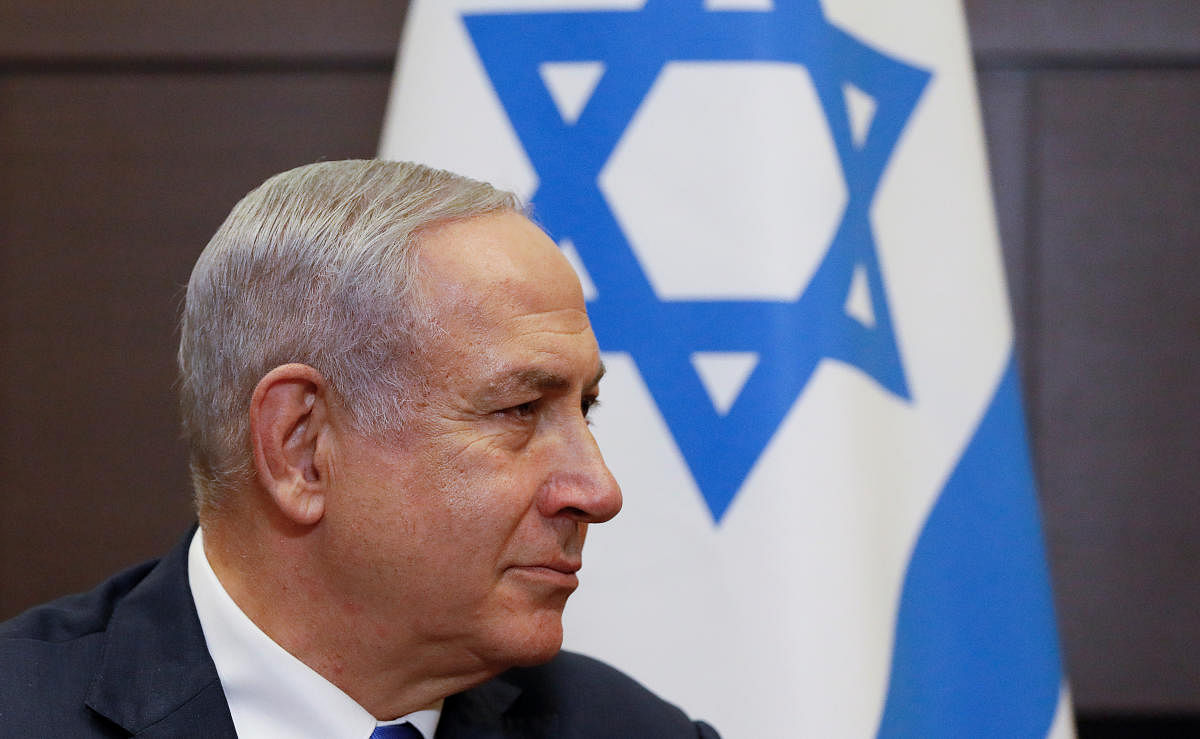 With Netanyahu locked in a razor tight race and facing the likelihood of criminal corruption charges, a decisive victory in Tuesday's vote may be the only thing to keep him out of the courtroom.
