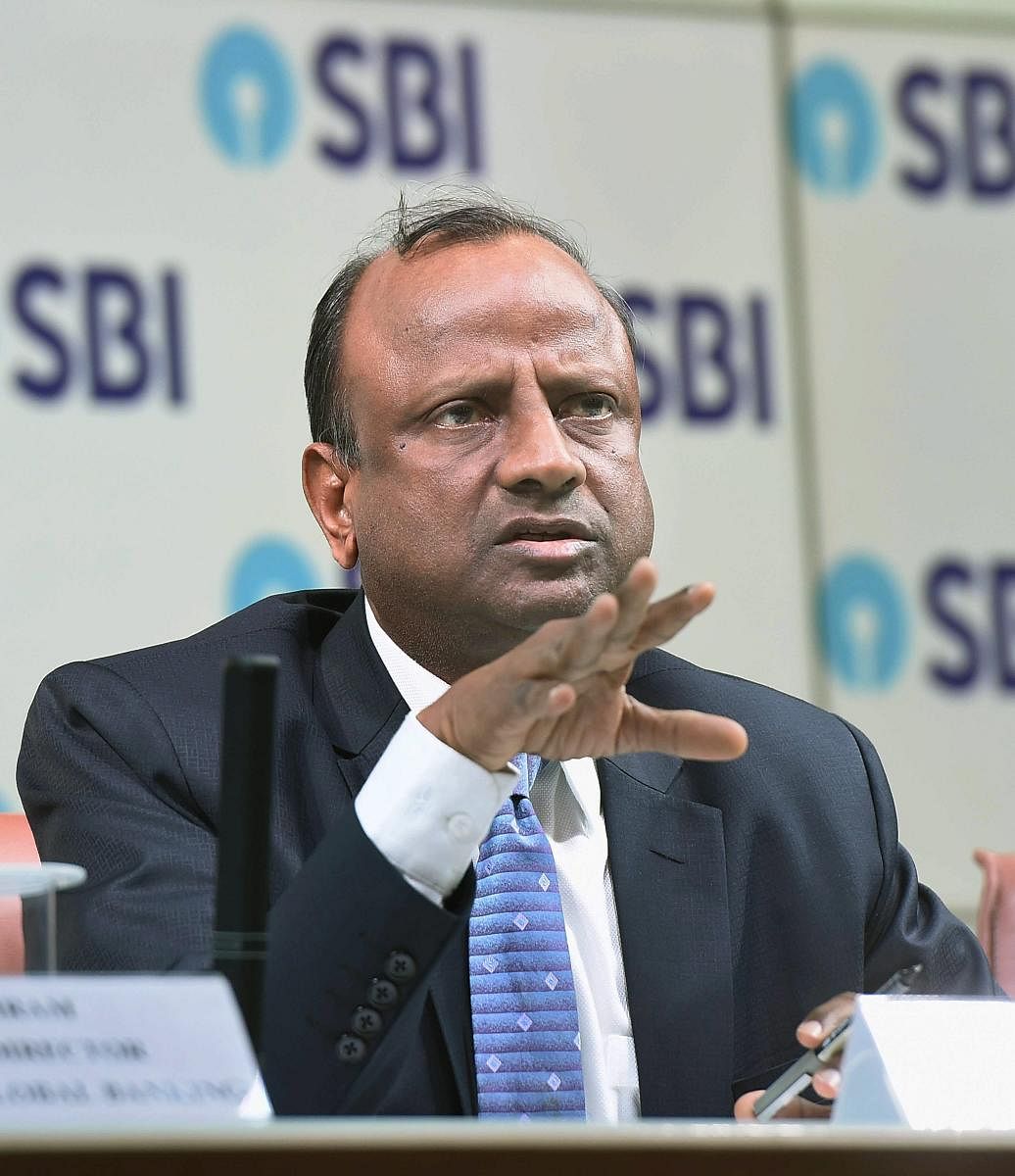 SBI chairperson Rajnish Kumar during the announcement of Q4 results, in Mumbai, on Tuesday. PTI
