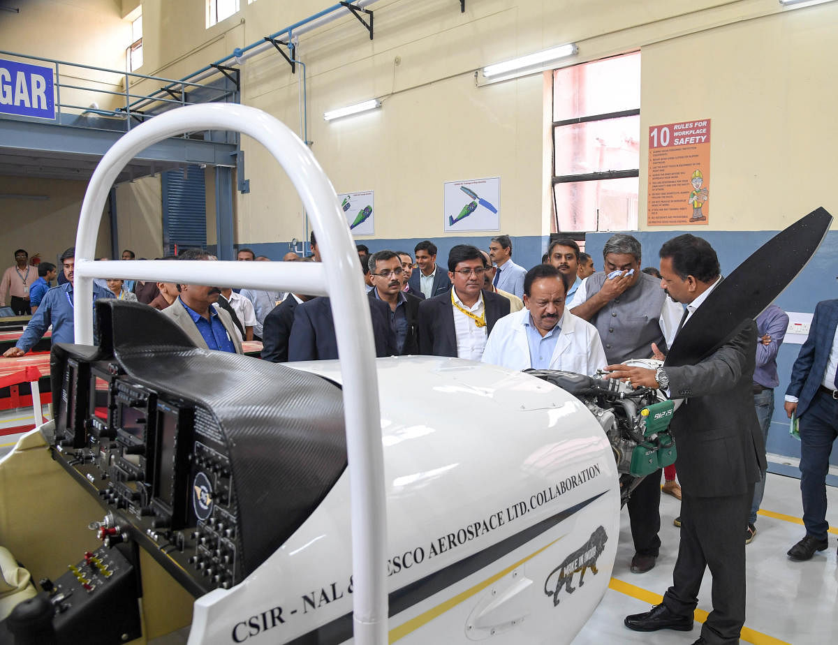 Union Minister for Science and Technology Dr Harsh Vardhan inaugurates the smart aerospace composites manufacturing facility at CSMST, NAL in Bengaluru on Monday. Jitendra J Jadhav, director, CSIR-NAL, is also seen. dh photo/B H Shivakumar