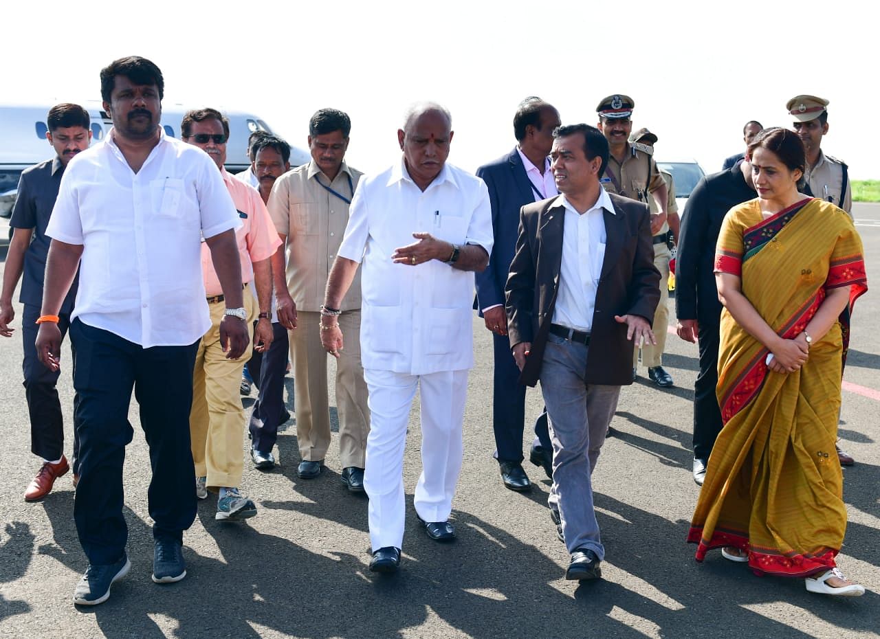 Chief Minister  B S Yediyurappa at Gulbarga airport in Kalaburagi on Tuesday. DH Photo