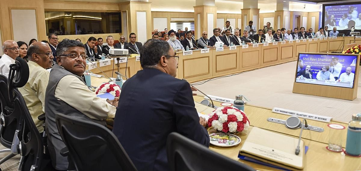 Union Minister for Communications, Electronics and IT Ravi Shankar Prasad chairs a round table discussion with CEOs' on 'India: Towards A Global Electronic Hub', at Vigyan Bhavan, in New Delhi. PTI
