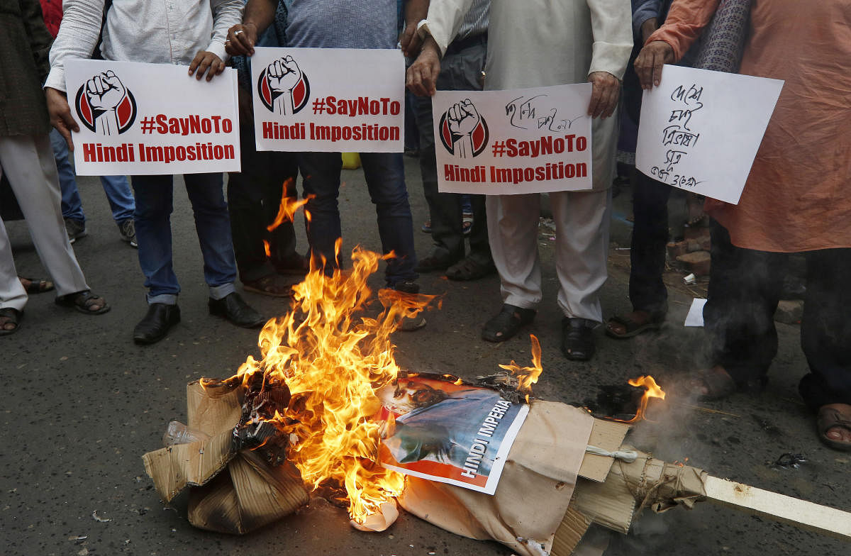 Protesters protest against Home Minister Amit Shah's proposal of 'One Nation, One Language' to promote Hindi, according to local media, in Kolkata, on September 16, 2019. REUTERS