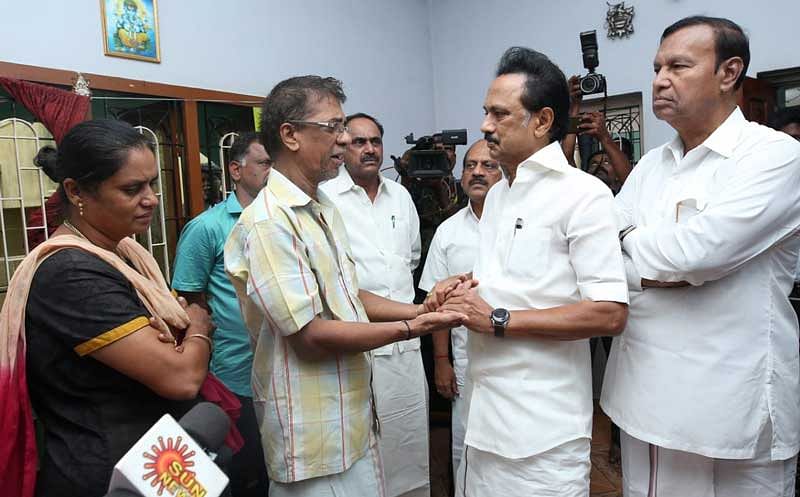 DMK President M K Stalin consoling the parents of 23-year-old Subhasri, who died in an accident after a hoarding fell on her in Chennai last week. DH Photo