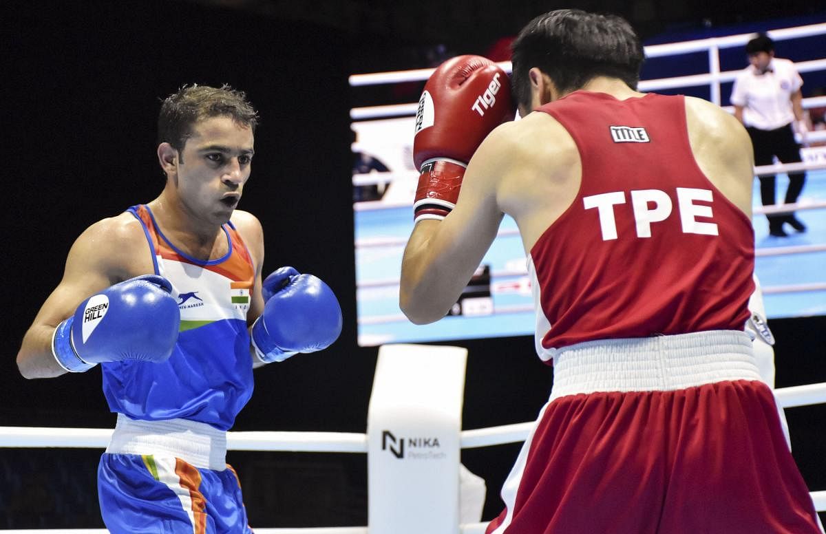 Asian Games gold medallist Amit Panghal (52kg) in action during the Round of 16 at the AIBA Men’s World Championships in Ekaterinburg, Russia, Saturday, Sept. 14, 2019. Photo/PTI 