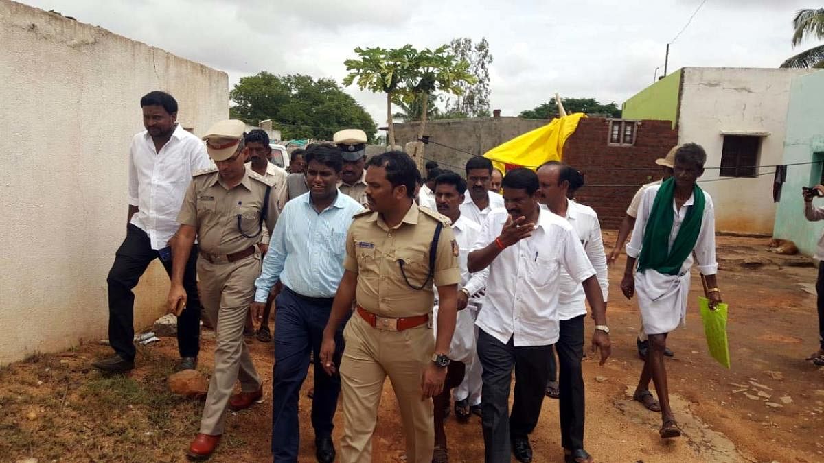 A team of senior officers visited Pemmanahalli Gollarahatti in Pavagada taluk of Tumakuru district on Wednesday. DH Photo