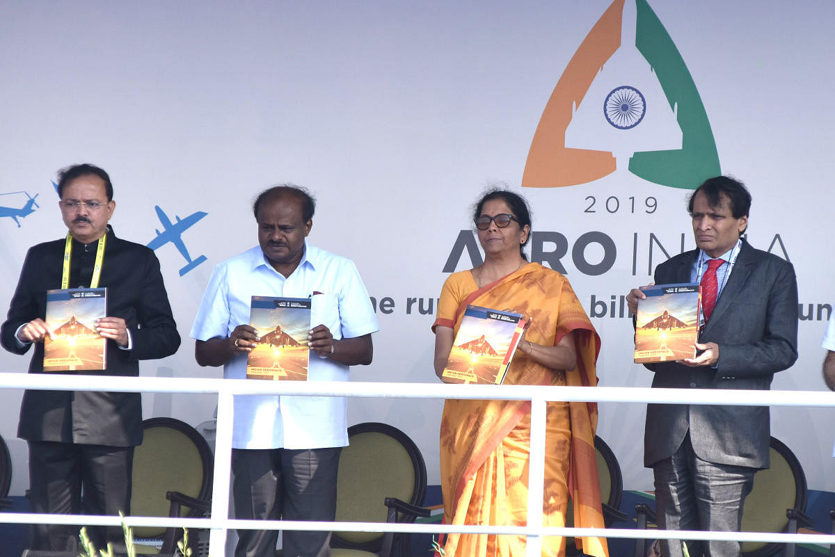 H D Kumaraswamy, Chief Minister, Nirmala Sitharaman, Defence Minister, Suresh Prabhu, Union Minister for Civil Aviation are seen at the inaugural of Aero India organised by Defence Ministry at Yalahanka Aero Space in Bengaluru on Wednesday. Photo by S K Dinesh
