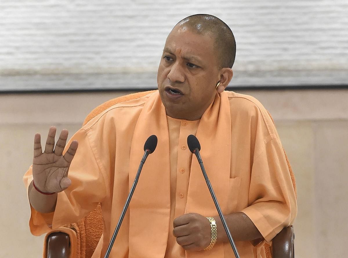 Uttar Pradesh Chief Minister Yogi Adityanath released a booklet on the achievements of his government. (PTI Photo)