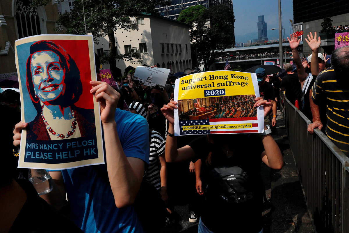 Protesters march to call for the United States Congress to pass the Hong Kong Human Rights and Democracy Act in Hong Kong, China September 8, 2019. REUTERS/File Photo