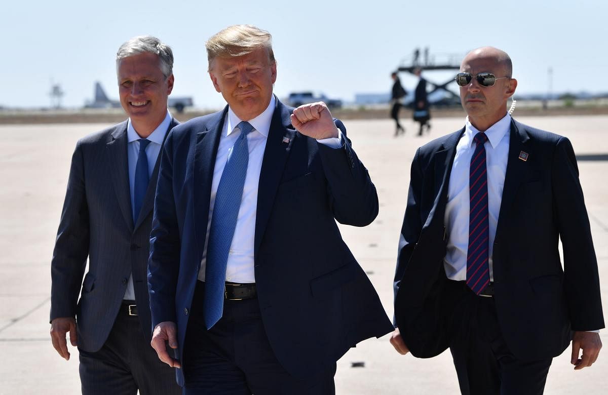 US President Donald Trump gestures after landing at San Diego International Airport in San Diego, California, on September 18, 2019. (AFP)