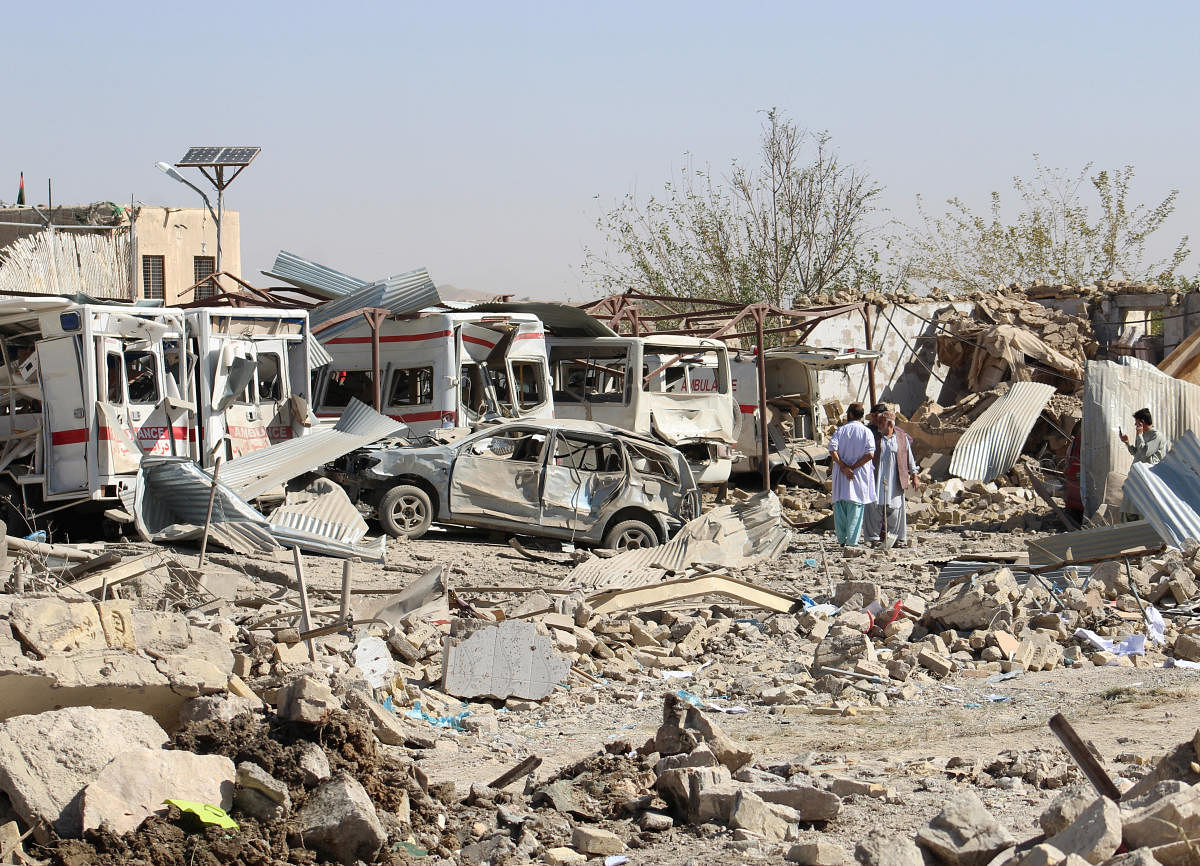 Damaged vehicles are seen at the site of a car bomb attack in Qalat, capital of Zabul province, Afghanistan September 19, 2019. (Photo by Reuters)