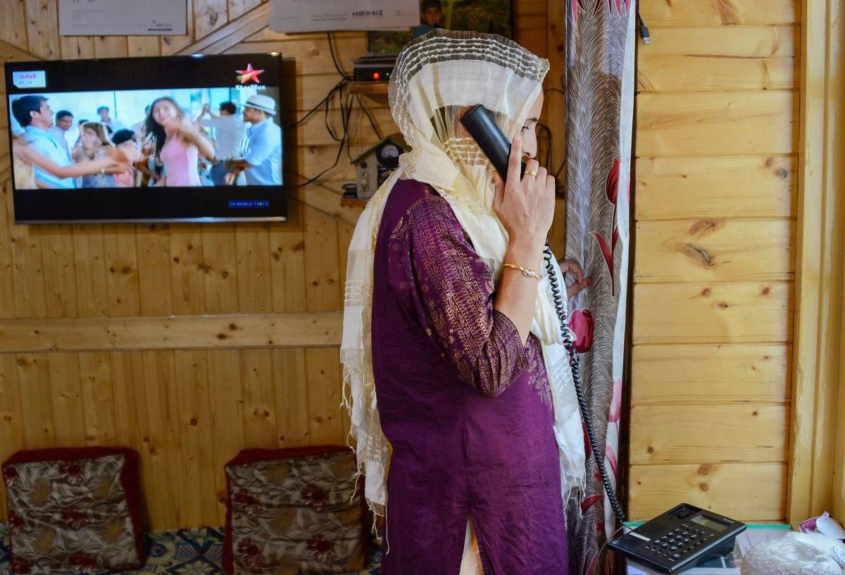 Landline telephone connections started working in the commercial hub of Lal Chowk and press colony in the early hours of September 5 but the communications blackout continues with virtually no mobile phone and internet services. (PTI Photo) 